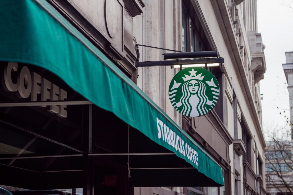 Street photography of a Starbucks store facade.