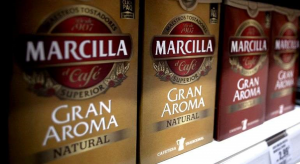 Shelf with Marcilla coffee containers great natural aroma and mix